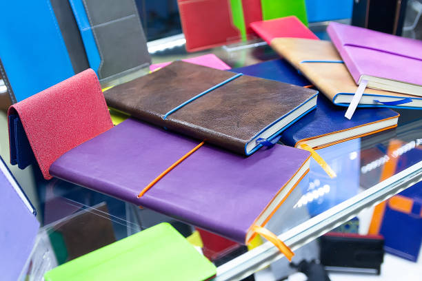 istock Multi-colored notepads on a counter in a supermarket. 2156935991