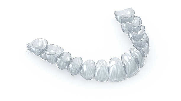 istock Invisalign braces or invisible retainer on white. Medically accurate dental 3D illustration 2156936279