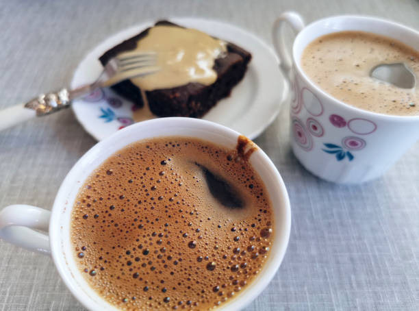 a cup of coffee and chocolate cake