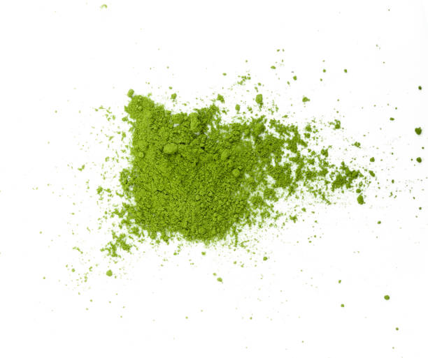 istock green tea powder on white background 2156937601