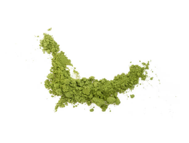 istock green tea powder on white background 2156937747