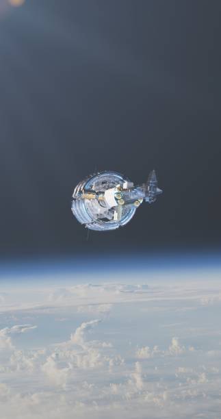 istock The space station is silhouetted against the Earth's backdrop 2156938319
