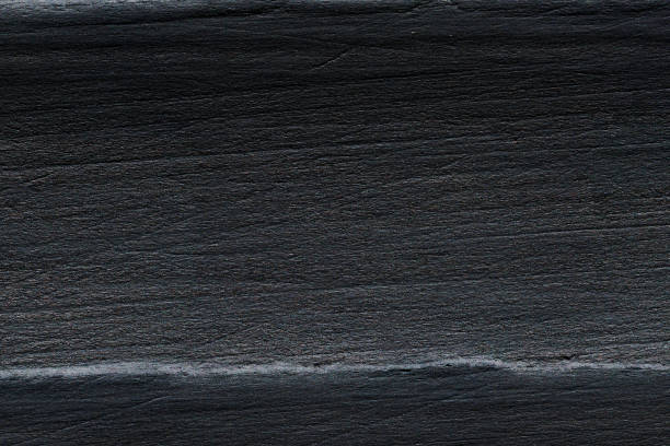 istock High angle view of a flat textured wooden board backgrounds. 2156944034