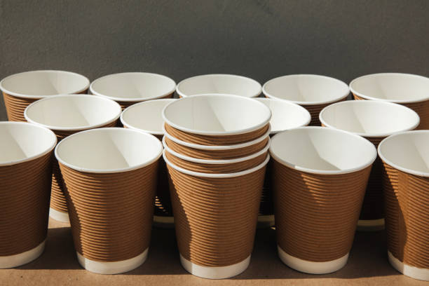 istock A set of paper utensils, cups on a brown background. Eco friendly, zero waste concept 2156948945