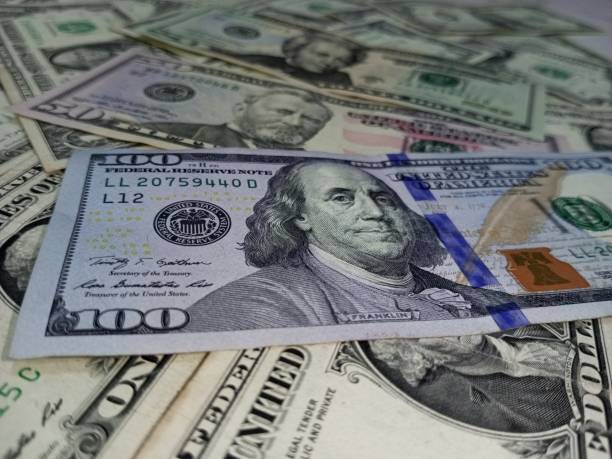 istock Money Background | Dollars Wallpaper | Dollar Bills 2156950730