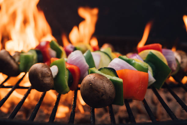 istock Vegetable Scewers on a Charcoal Grill with Flames 2156953894