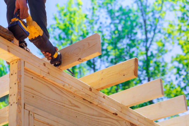istock Contractor builder uses a cordless reciprocating saw to cut beam during construction 2156964888