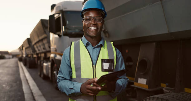 istock Construction site, portrait and black man on tablet for planning, building and maintenance. Civil engineering, architecture and person on digital tech for project, infrastructure and manufacturing 2156970902