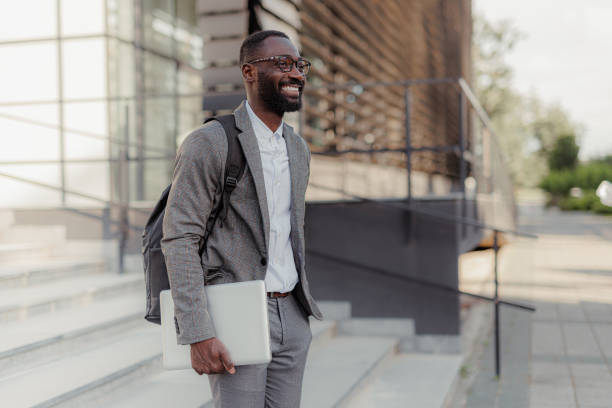 istock Young businessman leaving the office 2156971525