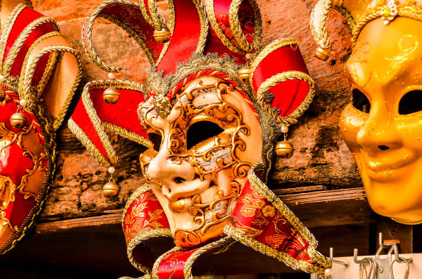 Venice, Italy - February 11, 2024: The Carnival of Venice (Italian: Carnevale di Venezia) is an annual festival held in Venice, Italy, famous throughout the world for its elaborate costumes and masks. \nThe Carnival ends on Shrove Tuesday (Martedì Grasso or Mardi Gras), which is the day before the start of Lent on Ash Wednesday (February-March).\nThe Carnival traces its origins to the Middle Ages, existing for several centuries until it was abolished in 1797. The tradition was revived in 1979, and the modern event now attracts approximately 3 million visitors annually.