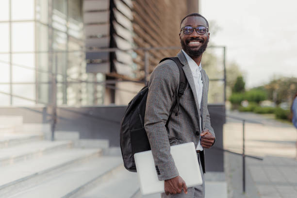 istock Young businessman leaving the office 2156971625