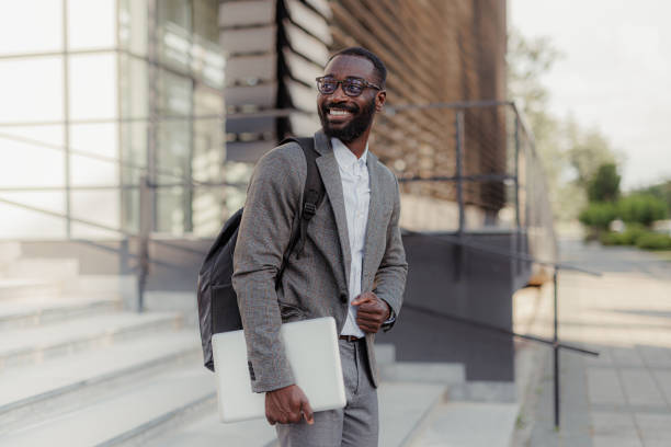 istock Young businessman leaving the office 2156971633