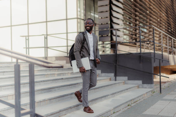 Young businessman leaving the office