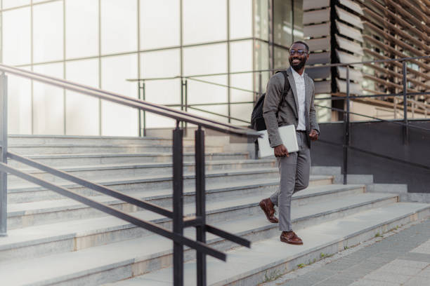 istock Young businessman leaving the office 2156971814