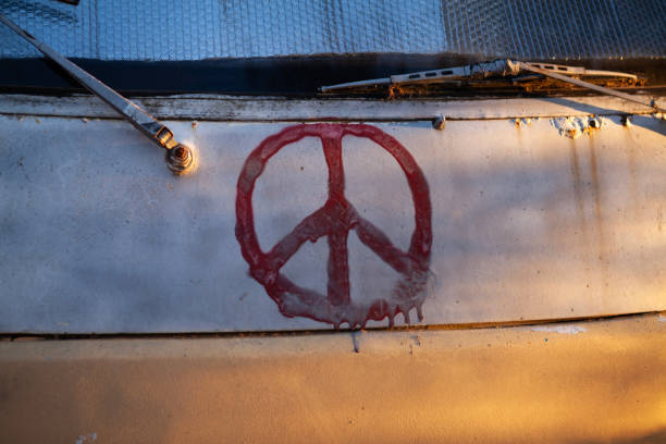 The word war is written on a black school board close-up