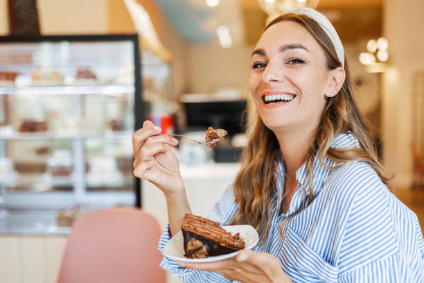 istock Woman Enjoying Dessert 2156972611