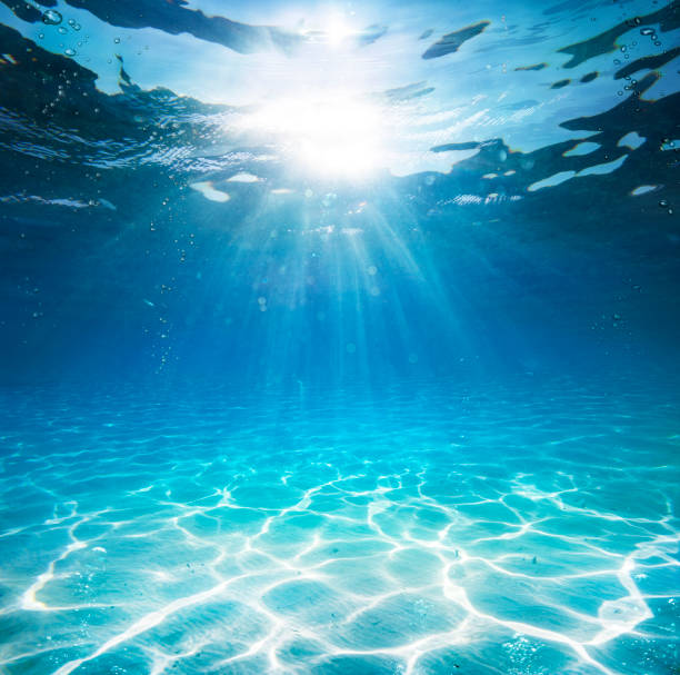 istock Underwater In Blue Sea - Deep Water Abyss With Abstract Sunshine 2156974161