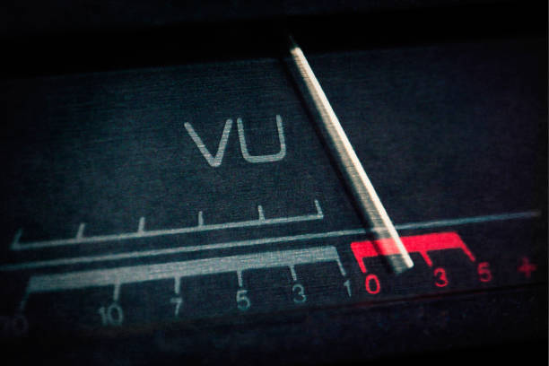 This detail view features the knobs of a vintage amplifier. The clean lines and minimalist design are typical of high-quality audio equipment from past decades. Ideal for articles on classic audio gear, collectors, and retro tech enthusiasts