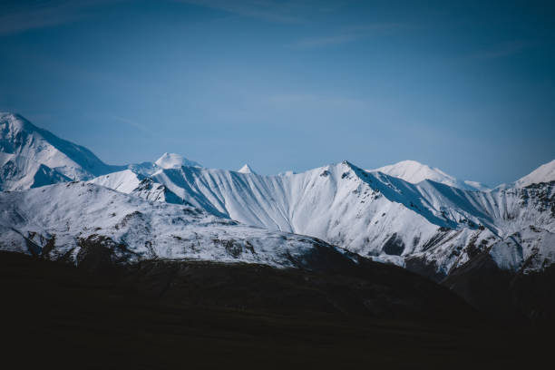 istock Alaskan Snowy Peaks Panorama 2156984650