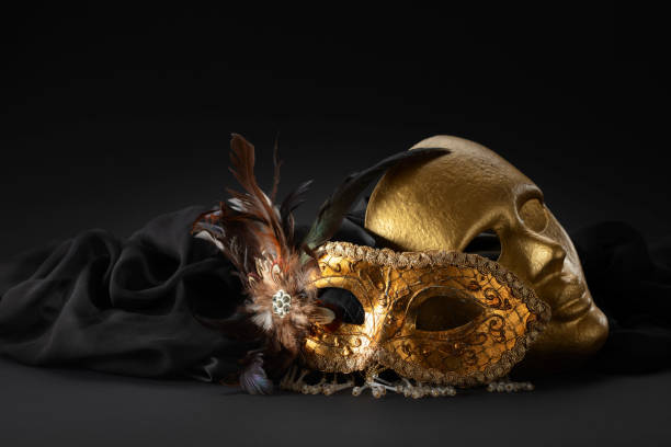 istock Golden Venetian carnival masks on a black background. 2156984773