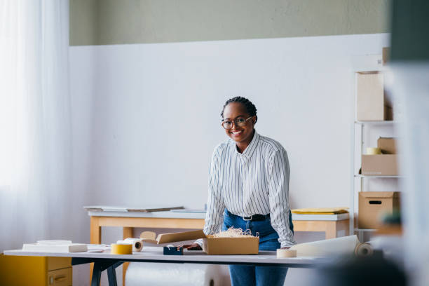 istock Confident Female Entrepreneur Working in a Bright Office 2156987623