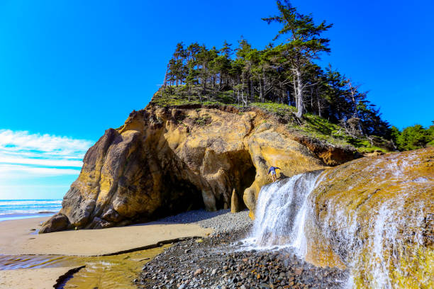 istock Hug Point Falls near Cannon Beach, Oregon 2156987693