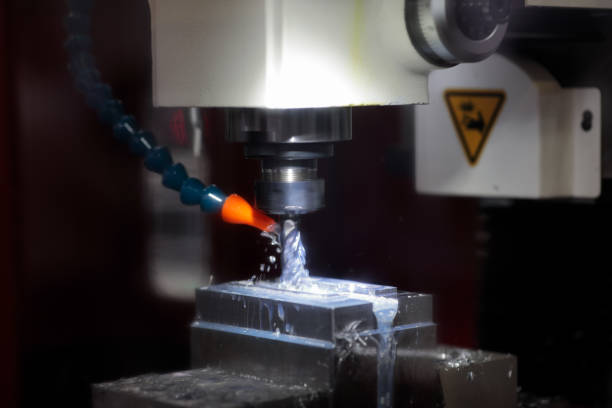 istock closeup of metal milling process using CNC machine 2156988788