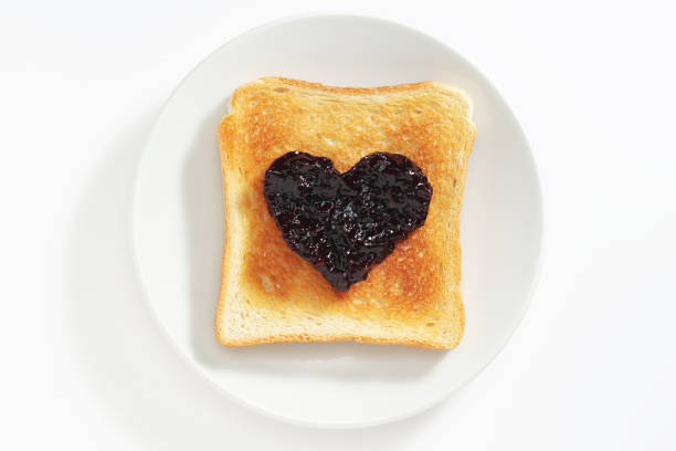 istock Toast with jam in the shape of a heart 2156991192