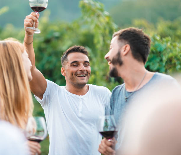 istock gay couple doing a wine tasting 2156991534