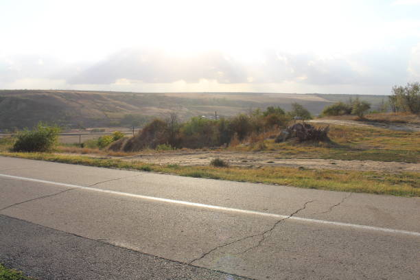 istock A road with a hill in the background 2156991989