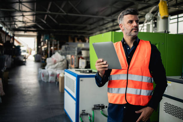 istock Manager from the factory arranging the production process 2156992974