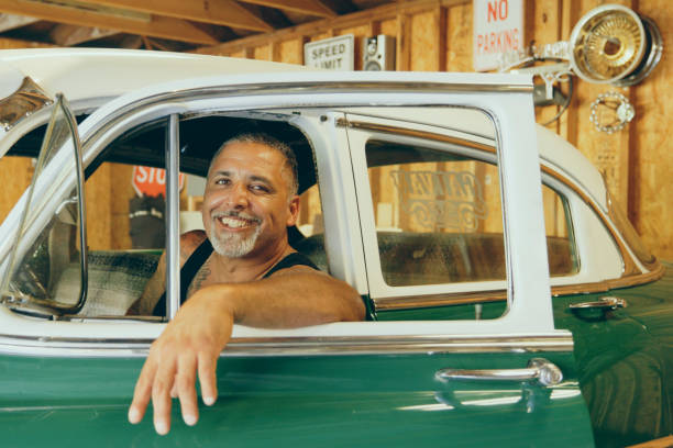 istock Mature Man in a Home Garage Looking at the Camera 2156995761