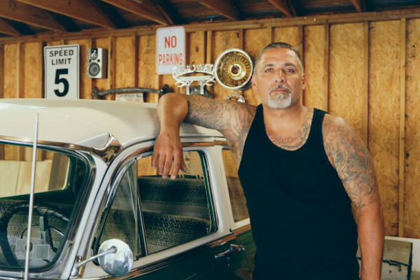 istock Mature Man in a Home Garage Looking at the Camera 2156995774