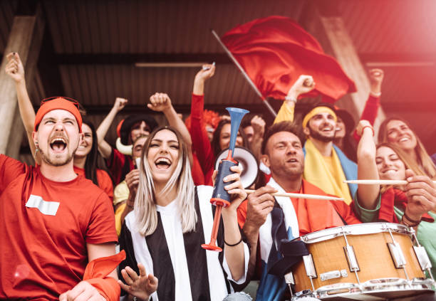 istock happiness sport supporter at the stadium 2156999500