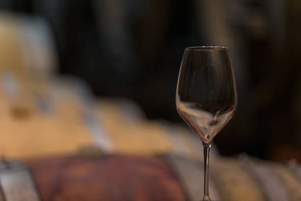 istock Wine cellar with a high ceiling, stone floor, oak barrels 2157000361