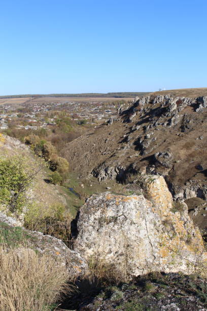 A rocky landscape with a blue sky