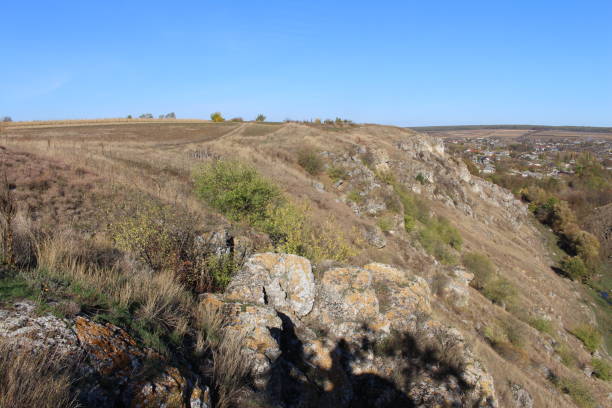 istock A rocky hill with a grassy area 2157004679
