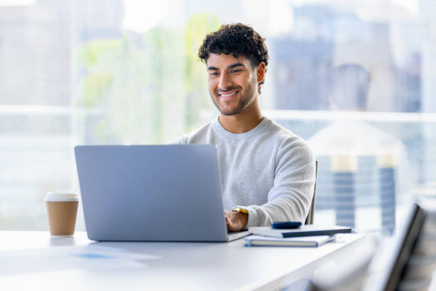 istock Businessman working on a laptop computer in the office 2157008128