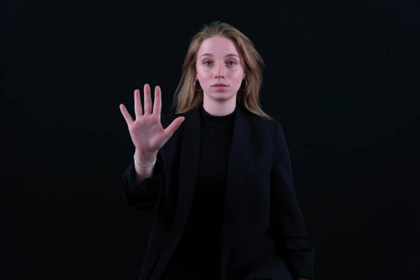 istock A young Businesswoman scanning his fingerprints virtually on screen. Open hand and five footprints. Fingerprint password. Biometric authentication concept, cyber security. 2157008239