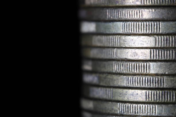 Stack of silver coins isolated on white background. Coin tower. 1000 National currency. Money concept, metal money