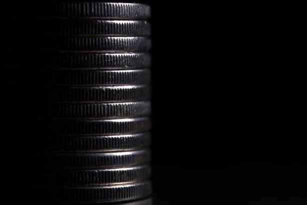 istock Stack of silver coins in close-up, texture of old coins 2157009129