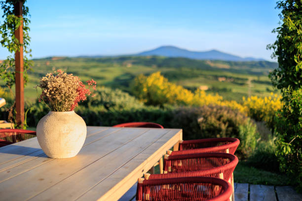 istock Tuscan garden patio dinning table 2157014024