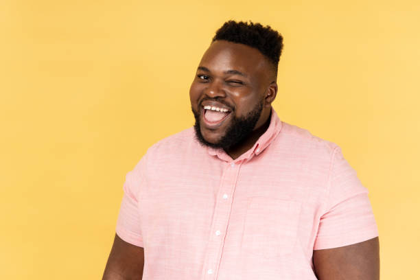 istock Man winking and optimistically smiling, good mood, cunning bearded guy flirting. 2157015318