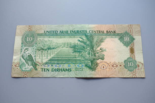 istock The Arab Emirates Dirham Arabic. ISO code AED is the official currency of the United Arab Emirates. Dirham is subdivided into 100 fils. Dirham was officially pegged to the IMF special drawing rights 2157015927