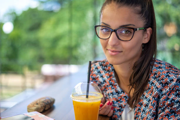 istock A business lady relaxes in the nearest cafe. 2157017020