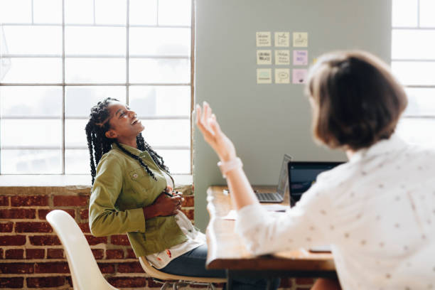 istock Cheerful diverse colleagues at the office 2157024330