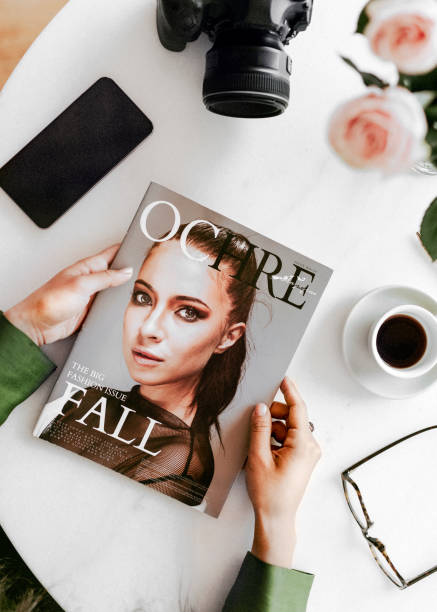 istock Hands holding a fashion magazine 2157024457
