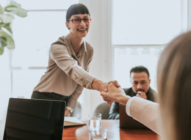 istock Happy diverse business people making a deal 2157026625