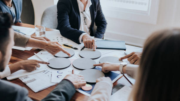 istock Business people using blank round paper for brainstorming 2157026675