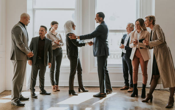istock Happy diverse business people making a deal 2157026697